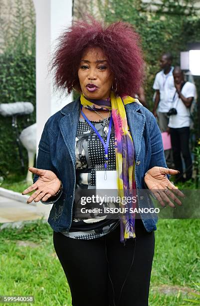 Ivorian actress, director and show creator Akissi Delta poses for a picture at a film set during the shooting of the television series 'Ma Famille'...