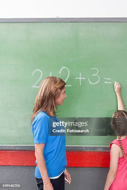 teacher teaching math - junior girl models stock pictures, royalty-free photos & images