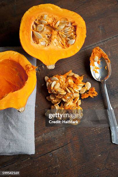 directly above shot of squash on table - squash seeds stock-fotos und bilder