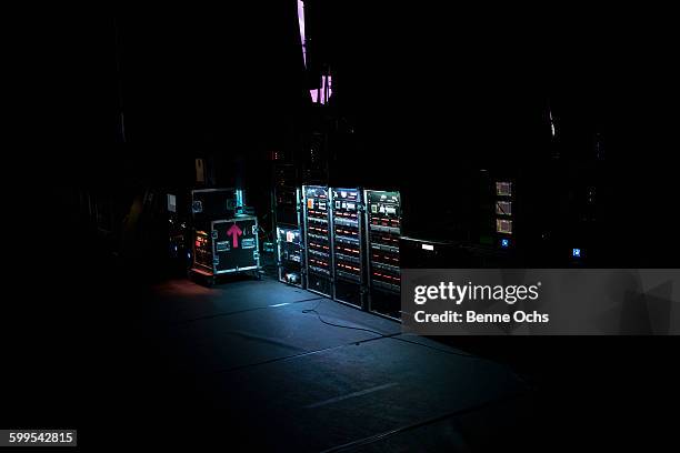 illuminated amplifiers on stage - amp stock pictures, royalty-free photos & images