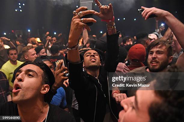 Rapper Vic Mensa moshes in the crowd during Kanye West: The Saint Pablo Tour at Madison Square Garden on September 5, 2016 in New York City.