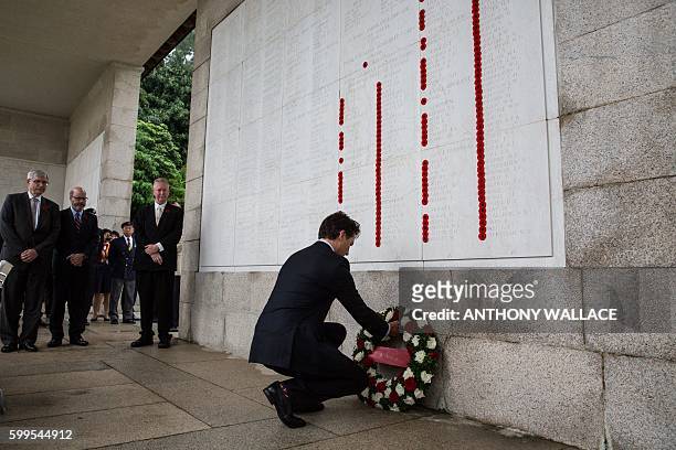 Canadian Prime Minister Justin Trudeau lays a wreath at the Sai Wan War Cemetery during his visit to Hong Kong on September 6, 2016. Trudeau is here...