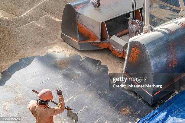 high angle view of worker working at port - basel port stock pictures, royalty-free photos & images