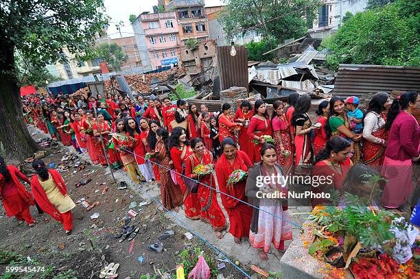 Nepalese Hindu devotees lining to offer ritual prayer at the Rishishwor Mahadev Temple during Rishi Panchami Festival celebrations at Teku, Katmandu,...