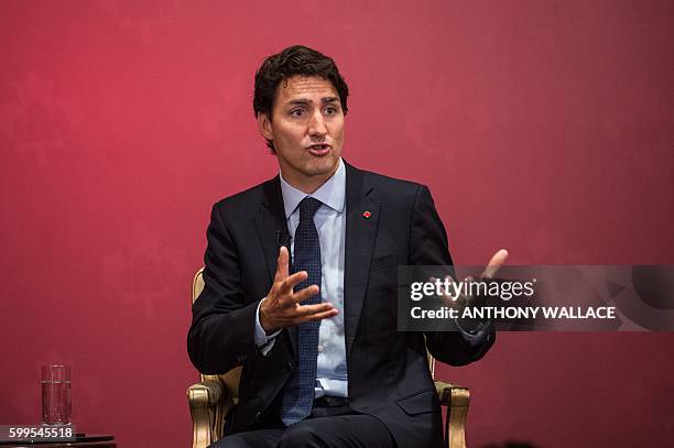 Canadian Prime Minister Justin Trudeau answers a question during a Canada-Hong Kong business luncheon, held by the Canadian Chamber of Commerce,...