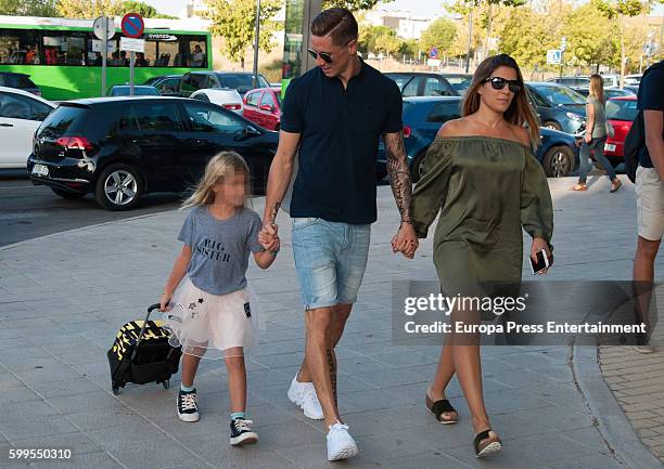 Atletico de Madrid football player Fernando Torres, his wife Olalla Dominguez and their daughter Nora Torres are seen on September 6, 2016 in Madrid,...