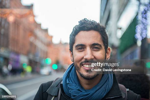 handsome young man in city - beautiful irish person stockfoto's en -beelden