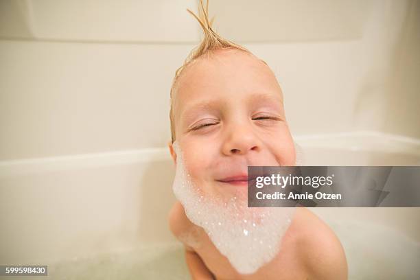 little boy with a bubble beard - schaumbad stock-fotos und bilder