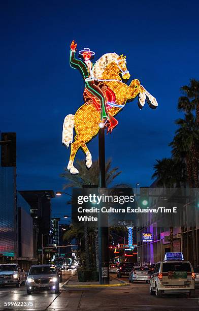 neon signs in centre of road, downtown las vegas, nevada, usa - cultura americana stock pictures, royalty-free photos & images