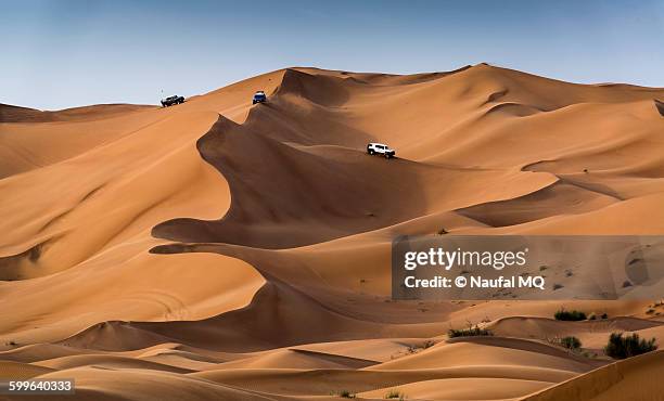 desert safari - atv sand dune stock pictures, royalty-free photos & images