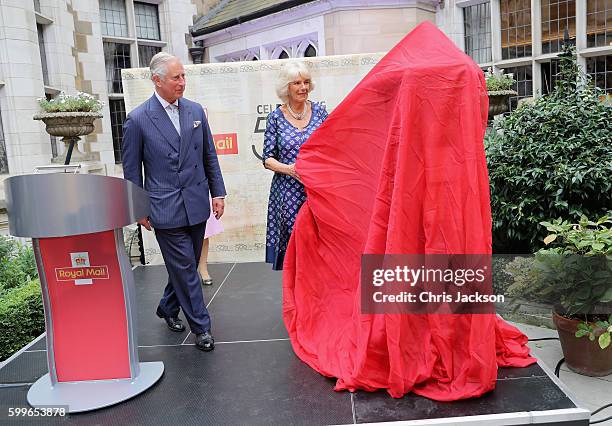 Prince Charles, Prince of Wales and Camilla, Duchess of Cornwall unveil a penfold postbox as they attend a reception to mark the 500th Anniversary of...