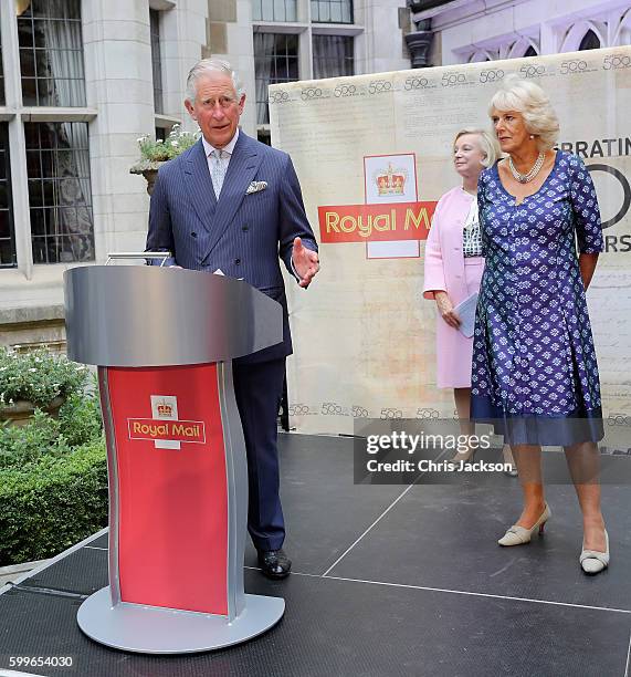 Prince Charles, Prince of Wales gives a speech as CEO of Royal Mail Moya Breene and Camilla, Duchess of Cornwall looks on as he attends a reception...