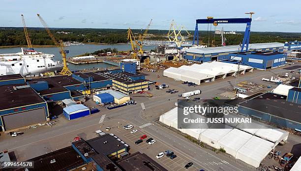 This picture taken on September 6, 2016 shows Meyer Turku shipyard in Pansio, Turku. It was announced today that Carnival Corporation shipping...