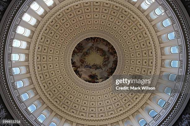 The ceiling of the newly restored rotunda is seen inside the US Capitol, September 6, 2016 in Washington, DC. Today the House and Senate are...