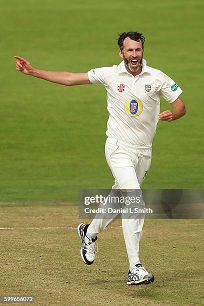 Graham Onions of Durham reacts after dismissing Andrew Gale of Yorshire during the Specsavers County Championship Division One match between...