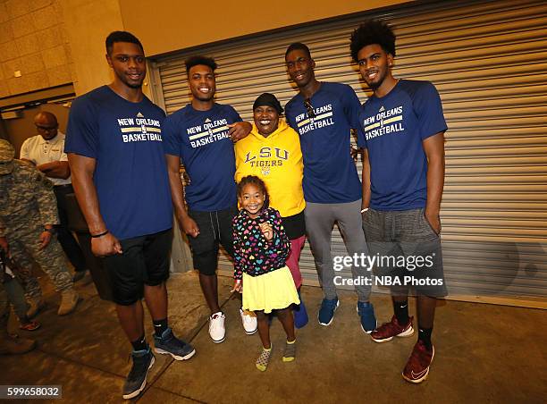 Terrence Jones, Buddy Hield, Shawn Dawson and Cheick Diallo of the New Orleans Pelicans participate in a community outreach initiative which had...