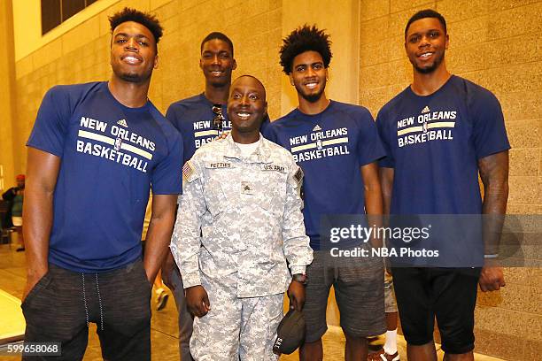 Terrence Jones, Buddy Hield, Shawn Dawson and Cheick Diallo of the New Orleans Pelicans participate in a community outreach initiative which had...