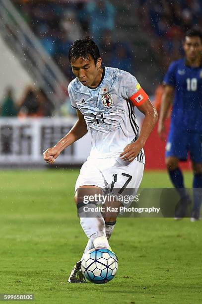 Makoto Hasebe of Japan dribbles during the 2018 FIFA World Cup Qualifier between Thailand and Japan at the Rajamangala National Stadium on September...