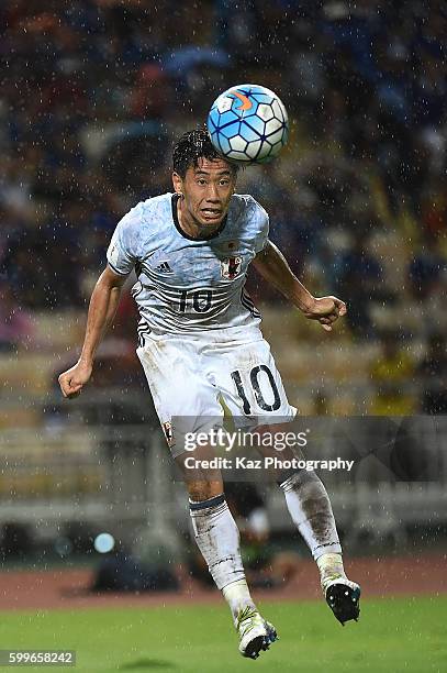 Shinji Kagawa of Japan heads during the 2018 FIFA World Cup Qualifier between Thailand and Japan at the Rajamangala National Stadium on September 6,...