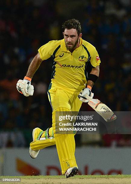 Australia's Glenn Maxwell runs between the wickets during the first T20 international cricket match between Sri Lanka and Australia at the Pallekele...