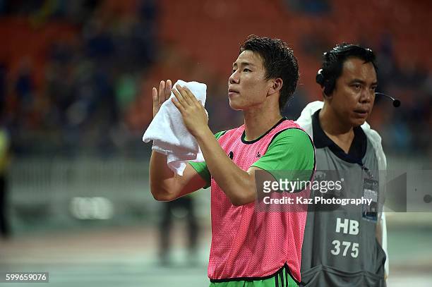 Takuma Asano greets the fans after the 2018 FIFA World Cup Qualifier between Thailand and Japan at the Rajamangala National Stadium on September 6,...