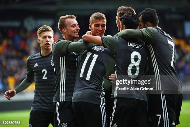 Serge Gnabry of Germany celebrates his team's first goal with team mates during the 2017 UEFA European U21 Championships Qualifier between U21...