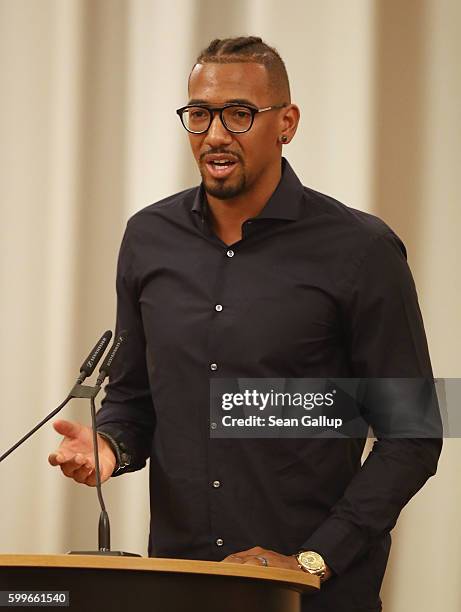 Bayern Munich football star Jerome Boateng speaks after receiving the 2016 Moses Mendelssohn Award on September 6, 2016 in Berlin, Germany. The award...