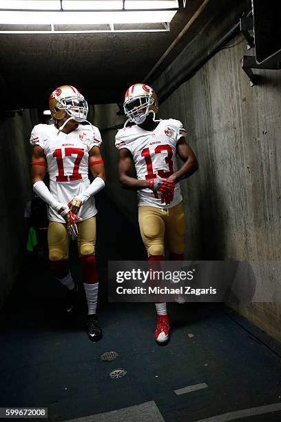 Dres Anderson and Aaron Burbridge of the San Francisco 49ers get ready to take the field prior to the game against the San Diego Chargers at Qualcomm...