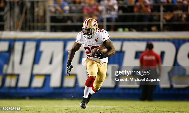 Mike Davis of the San Francisco 49ers rushes during the game against the San Diego Chargers at Qualcomm Stadium on September 1, 2016 in San Diego,...