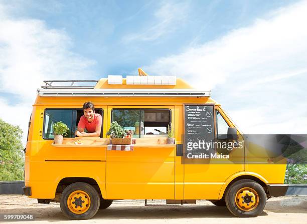 food truck in the street - foodtruck stockfoto's en -beelden