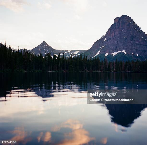 two medicine lake at sunset, glacier national park - two medicine lake montana stockfoto's en -beelden