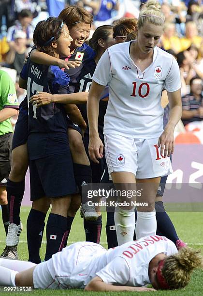 England - Japan's captain Aya Miyama celebrates after scoring the team's second goal during the first half of an Olympic women's soccer Group F...