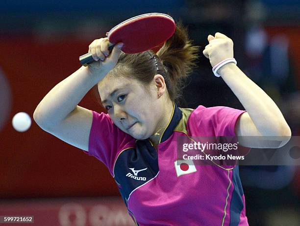 Britain - Japan's Ai Fukuhara returns a shot against Russia's Anna Tikhomirova in the third round of the women's table tennis singles match at ExCel...