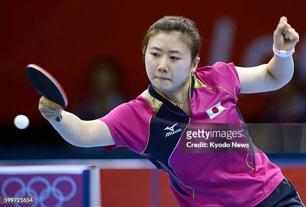 Britain - Japan's Ai Fukuhara plays against Russia's Anna Tikhomirova in the third round of the women's table tennis singles match at ExCel London at...