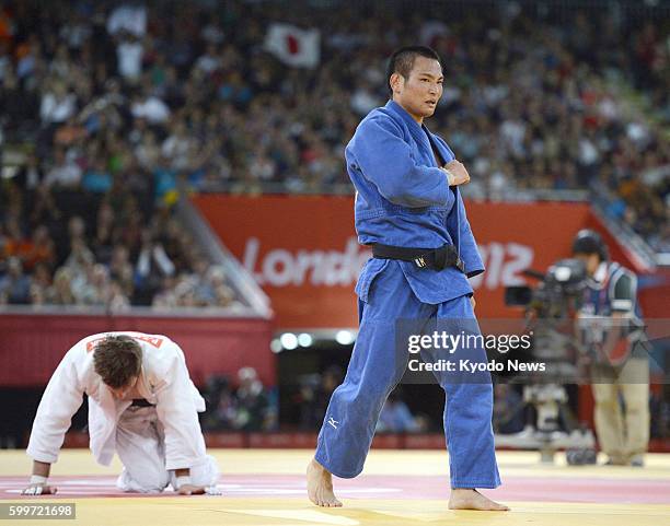 Britain - Japan's Masashi Ebinuma beats Poland's Pawel Zagrodnik during the bronze medal finals in the men's judo 66-kilogram category at the ExCel...