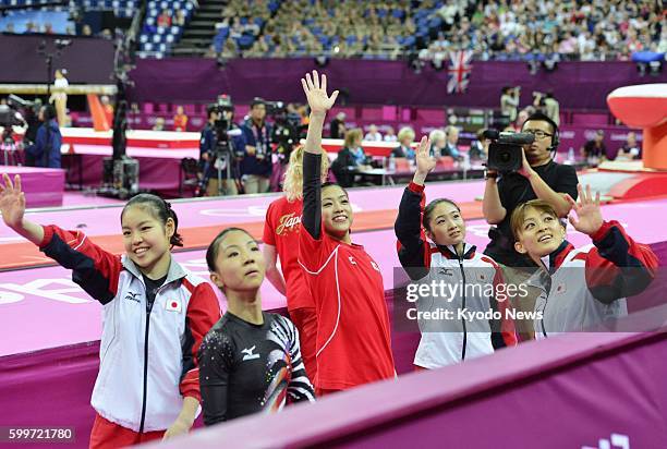 Britain - Yu Minobe, Asuka Teramoto, Yuko Shintake, Koko Tsurumi, and Rie Tanaka wave to cheering spectators after the London Olympics women's...