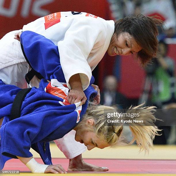 Britain - Japan's Kaori Matsumoto takes on France's Automne Pavia in a semifinal match in the women's judo 57-kilogram category at the 2012 London...