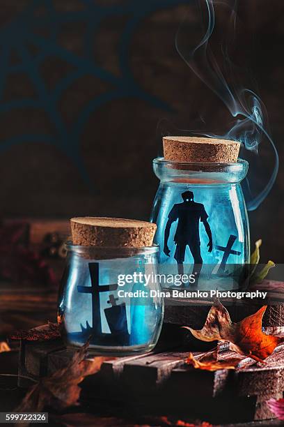 halloween jars with smoke, zombies and graveyard - vampire castle stock pictures, royalty-free photos & images