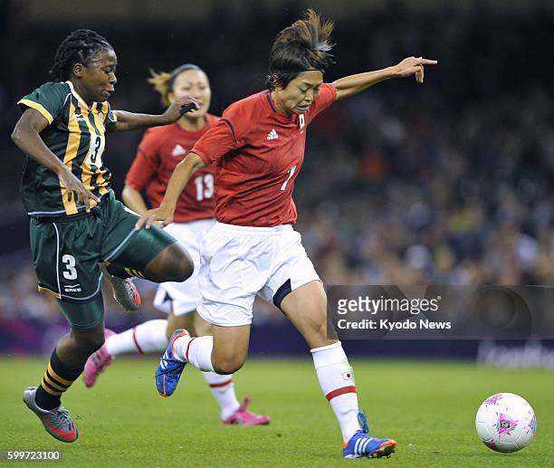 Wales - Japan's Kozue Ando vies for the ball during the first half of the women's soccer Group F match against South Africa at Millennium Stadium at...