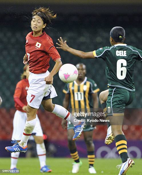 Wales - Japan's Kozue Ando heads the ball during the first half of the women's soccer Group F match against South Africa at Millennium Stadium at the...