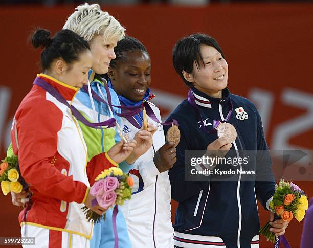 Britain - Japan's Yoshie Ueno poses with the bronze medal she won in the women's judo 63-kilogram category at the 2012 London Olympics, at the ExCeL...