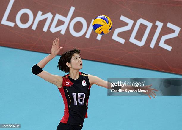 Britain - Japan's Saori Kimura serves during the first set of a match against the Dominican Republic in the Olympic women's volleyball tournament at...
