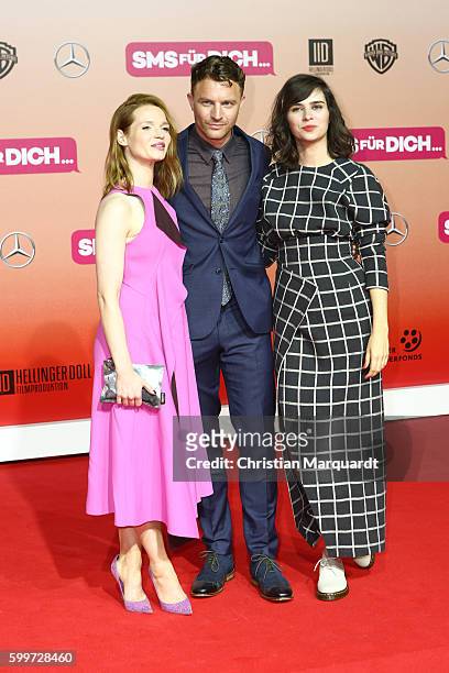 Karoline Herfurth, Friedrich Muecke and Nora Tschirner attend the German premiere of the film 'SMS fuer Dich' at CineStar on September 6, 2016 in...