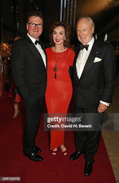 Ewan Venters, Carol Victor and Ed Victor attend the GQ Men Of The Year Awards 2016 at the Tate Modern on September 6, 2016 in London, England.