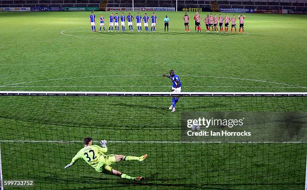 Samni Odelusi of Rochdale scores the winning penalty past Maskymillian Stryjek of Sunderland during the U-23 EFL Checkertrade Trophy Group F match...