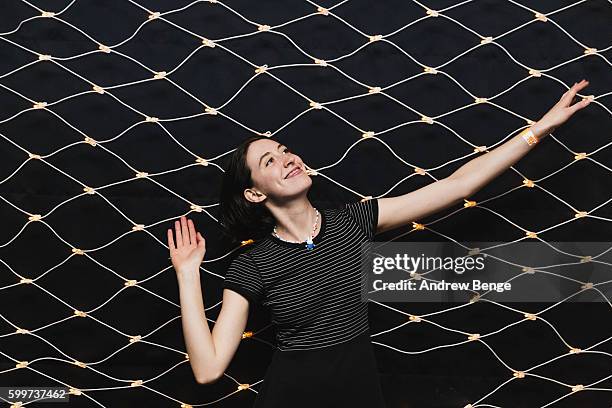 Frankie Cosmos poses backstage at Headrow House on September 6, 2016 in Leeds, England.