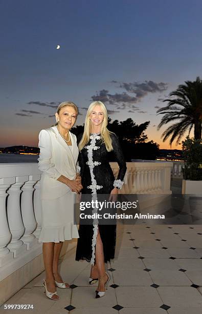 Farah Diba Pahlavi and Amanda Cronin attend the dinner with Queen Farah Diba Pahlavi at hotel Cap Estel on September 6, 2016 in Monaco, Monaco.