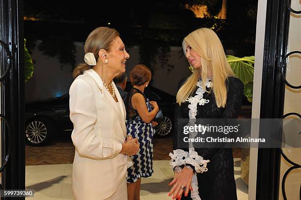 Farah Diba Pahlavi and Amanda Cronin attend the dinner with Queen Farah Diba Pahlavi at hotel Cap Estel on September 6, 2016 in Monaco, Monaco.