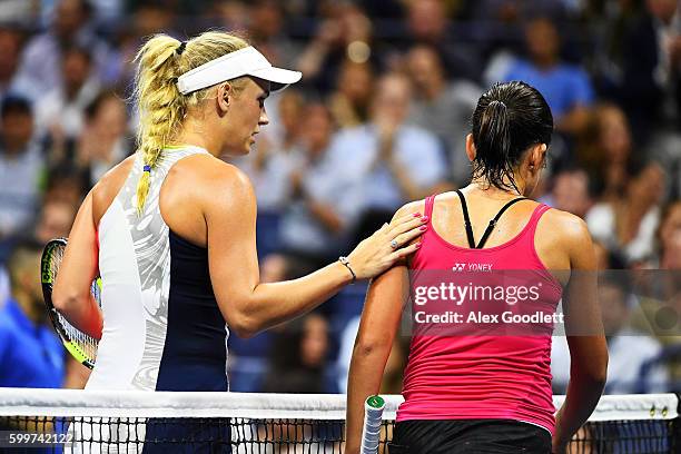 Caroline Wozniacki of Denmark celebrates defeating Anastasija Sevastova of Lativa during their Women's Singles Quarterfinals match on Day Nine of the...