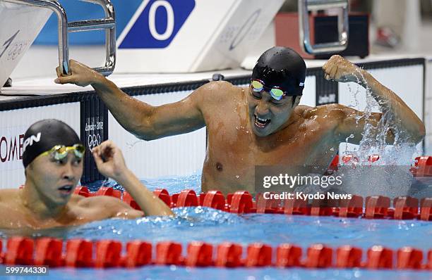 Britain - Japan's Ryo Tateishi celebrates his bronze medal finish in the men's 200-meter breaststroke final at the Aquatics Centre at the 2012 London...